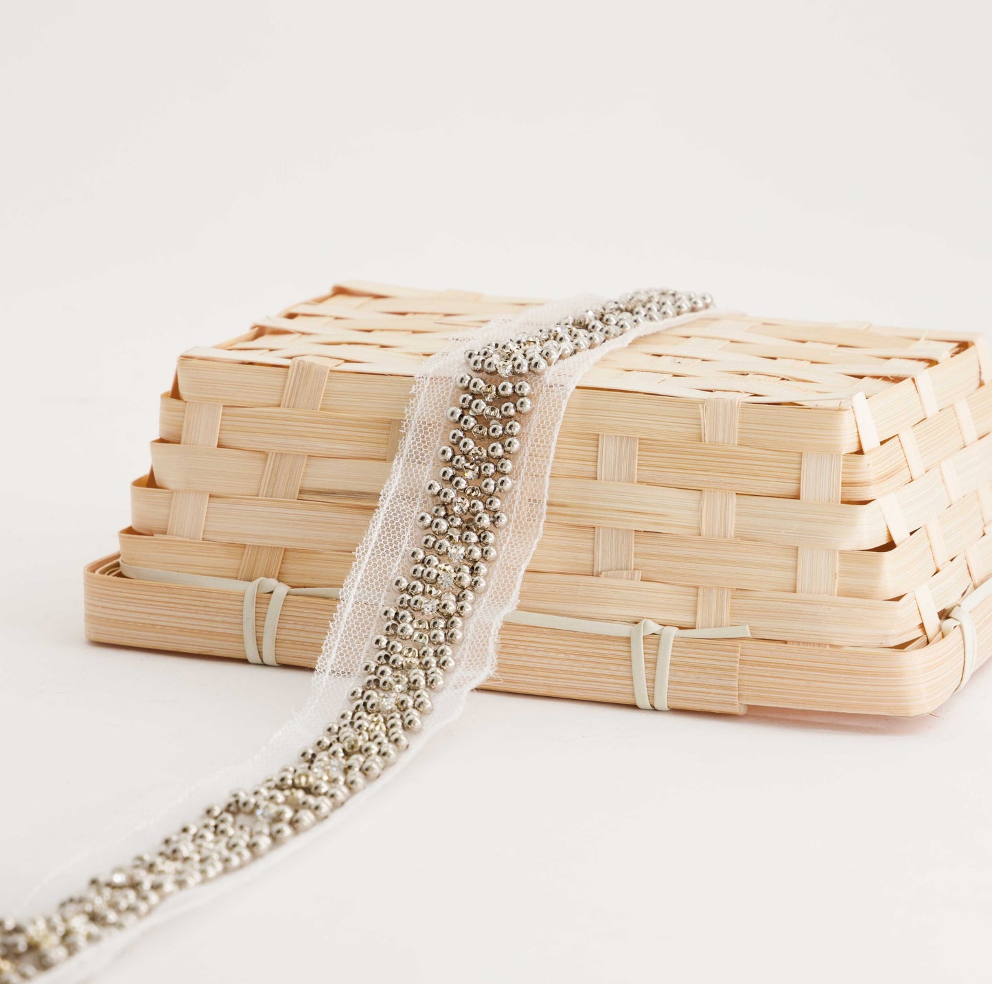 Gun Metal Pearls on White Mesh (SOLD PER METER)